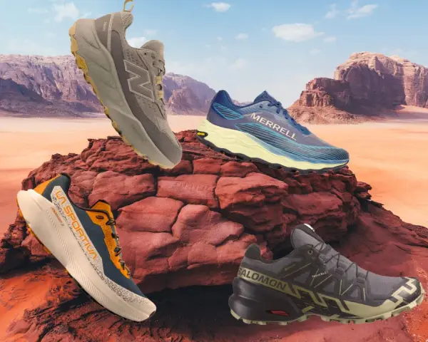 Scarpe trail running: un New Balance, un Merrell, un La Sportiva e un Salomon su rocce rosse nel deserto.