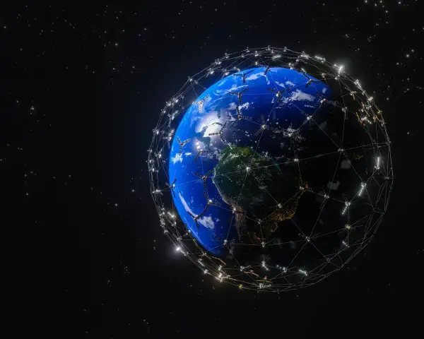 Ziemia otoczona siecią satelitów Starlink, symbolizującą globalny zasięg i prędkość internetu.