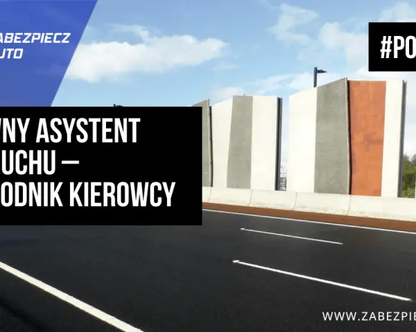 Aktywny asystent pasa ruchu – przewodnik kierowcy. Droga z nowoczesnymi barierami i chmurami na niebie. #PORADNIK
