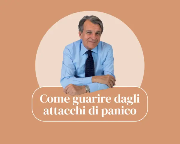 Uomo sorridente in camicia blu, con la scritta "Come guarire dagli attacchi di panico".