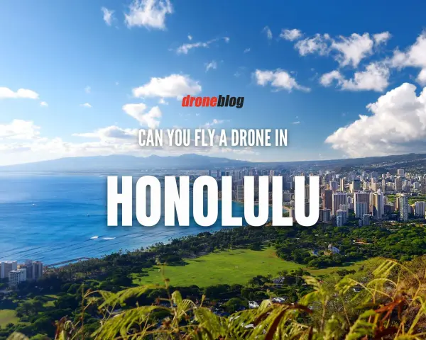 Aerial view of Honolulu, Hawaii, with text asking "Can you fly a drone in Honolulu?" Discussing Hawaii drone laws.