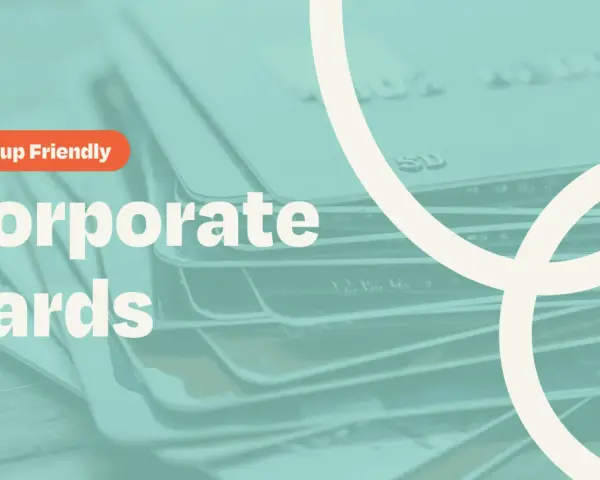 Stack of credit cards with "Startup Friendly Corporate Cards" text. Discover the most reliable corporate credit cards for startups.