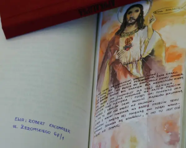 Modlitwa do świętego Antoniego, z ilustracją Jezusa i tekstem biblijnym.