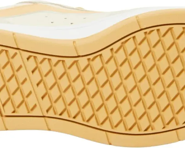 Suela de zapatilla Vans con patrón de rombos y logo blanco. Ideal para tu guía de tallas Vans.