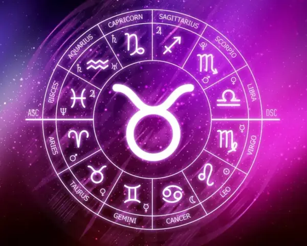 Okrąg zodiaku z symbolem Byka na pierwszym planie. 11 maja znak zodiaku to Byk, symbolizujący siłę i stabilność.