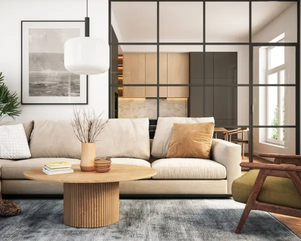 Gemütliche wohnideen wohnzimmer: Beige Sofa, Holztisch, grüner Sessel und eine offene Küche hinter Glas.