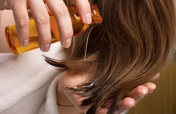 Öl für die Haare: Die besten Öle für gesundes und glänzendes Haar