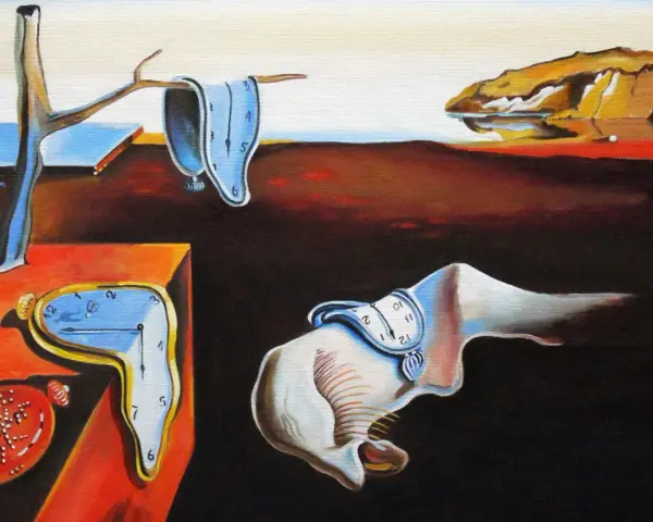 Salvador Dalí "Trwałość pamięci" - surrealistyczny krajobraz z topiącymi się zegarami, symbolem ulotności czasu.