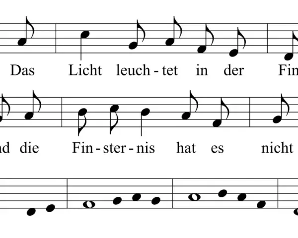 Notenblatt mit Text: "Das Licht leuchtet in der Finsternis und die Finsternis hat es nicht erfasst." Ein musikalischer Ausdruck von Psalm 123.