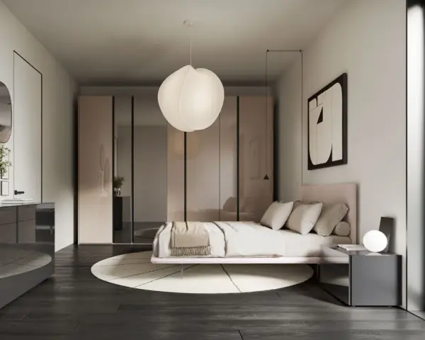 Camera da letto con letto rosa, armadi a specchio e comò grigio. Un'ispirazione per arredare casa moderna elegante con stile e raffinatezza.