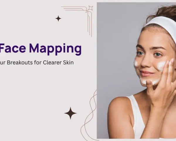 A woman applies foam to her face, illustrating the concept of acne face mapping to understand breakouts.