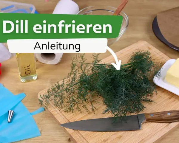 Frischer Dill liegt auf einem Holzbrett, bereit zum Dill einfrieren. Daneben liegen Öl, Butter und Küchenutensilien.