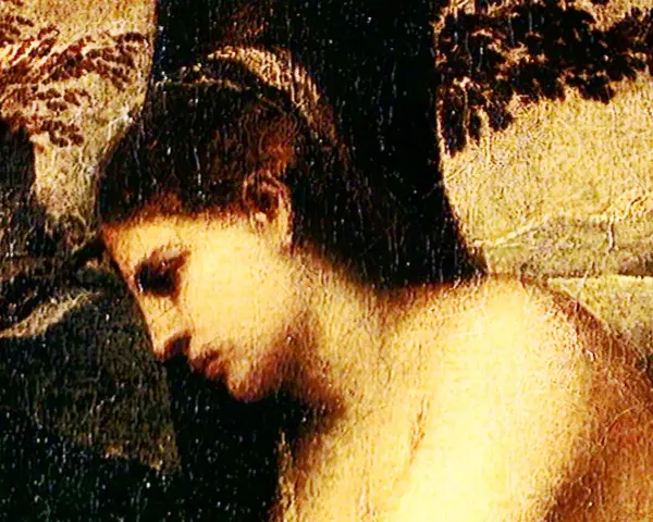 Détail du Concert champêtre titien : profil d'une femme aux cheveux sombres, baignée de lumière, dans une scène pastorale.