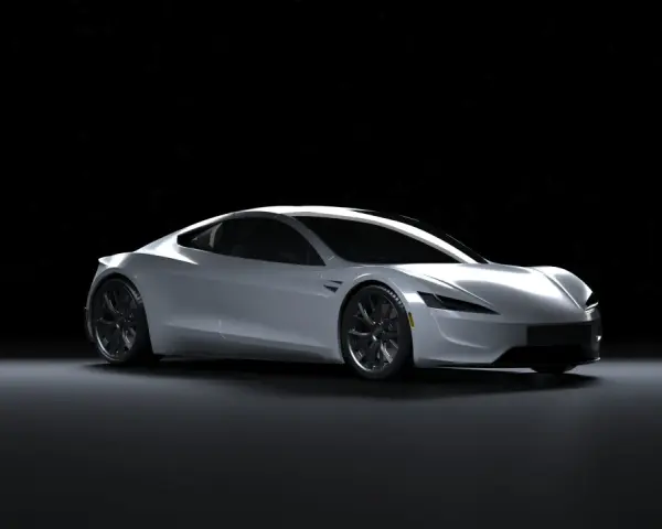 Srebrny Tesla Roadster na czarnym tle. Zastanawiasz się, ile kosztuje Tesla?