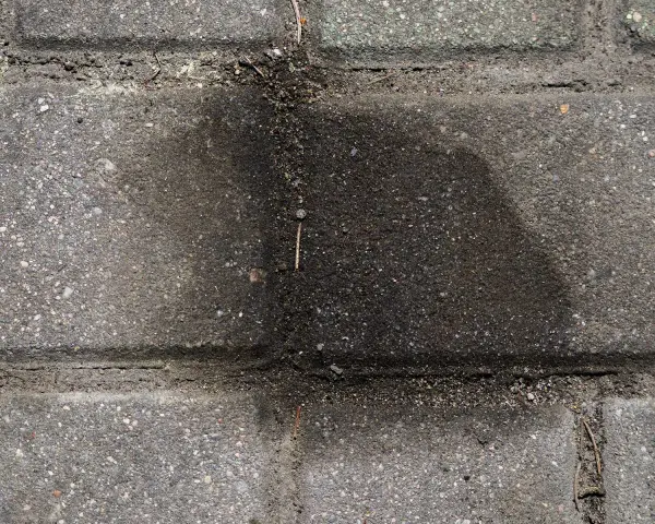 Jak usunąć asfalt z kostki brukowej - skuteczne metody i porady