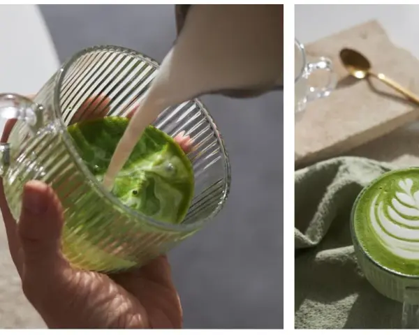 Jak zrobić matcha latte? Mleko wlewane do zielonego napoju, tworząc piankę. Gotowy napój z latte art.