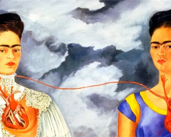 Les deux Fridas, deux portraits de l'artiste reliés par une artère, l'une en robe victorienne, l'autre en tenue colorée.
