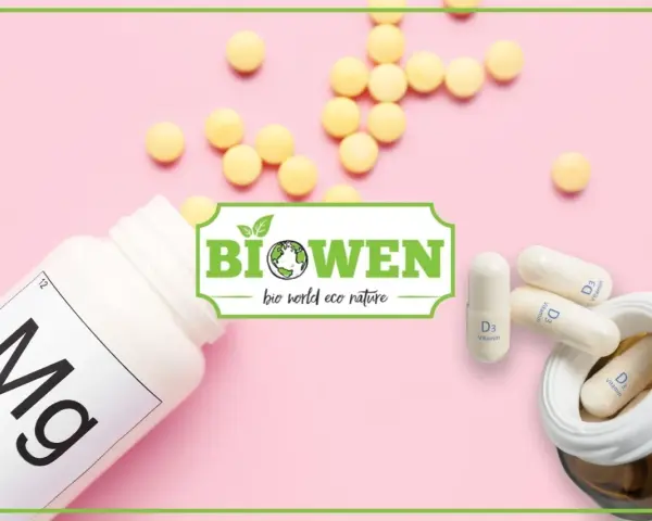 Biała butelka z magnezem, kapsułki z witaminą D3 i żółte tabletki. Logo "Biowen" sugeruje naturalne suplementy, być może zawierające kwas orotowy.