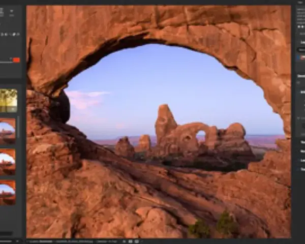 Interface d'un logiciel retouche photo automatique, montrant un paysage désertique à travers une arche rocheuse. Des filtres prédéfinis sont visibles sur la gauche.