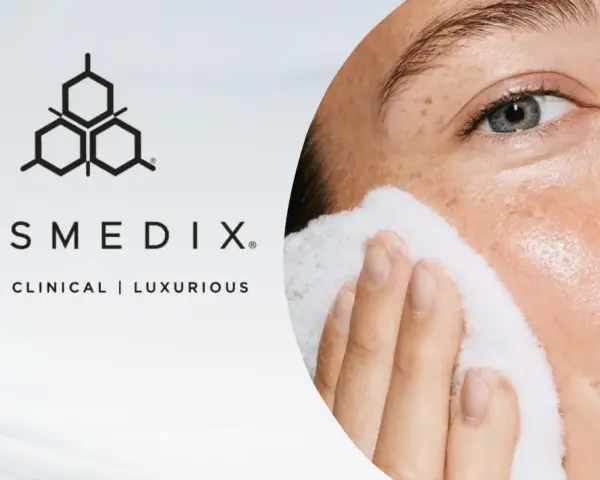 A woman's face is gently cleansed with a white pad, showcasing the benefits of enzyme exfoliation for radiant skin.