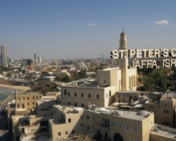 St. Peter's Church in Jaffa, Israel, a city with deep roots in the bible, overlooks the Mediterranean Sea and a modern skyline.