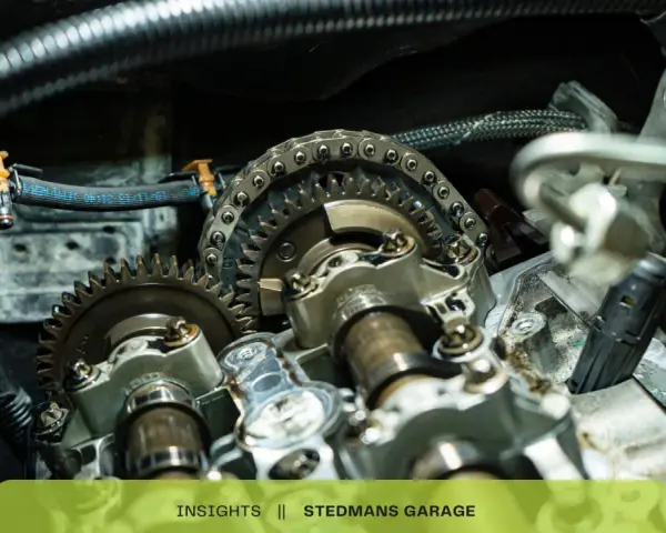 Close-up of car engine timing chain and gears. This could be related to a p0017 code issue.