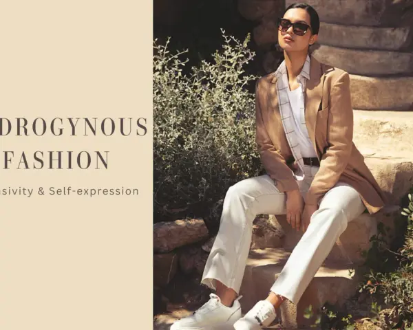 Mujer con estilo andrógino, viste blazer y pantalones blancos, transmitiendo inclusividad y autoexpresión.