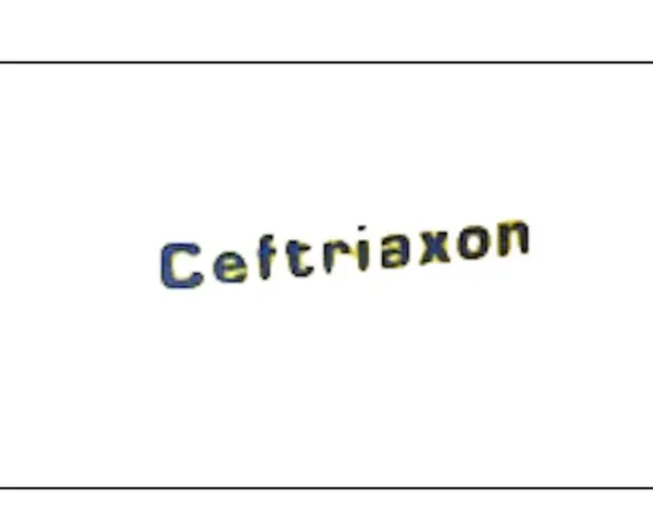 Napis "Ceftriaxon" w kolorze niebiesko-żółtym, lek stosowany w leczeniu infekcji.