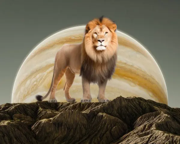 Majestatyczny lew na skalistym szczycie, z Jowiszem w tle. Król kosmosu, jakby Mars w Lwie.