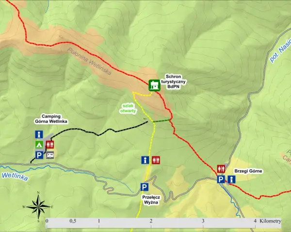 Mapa turystyczna z zaznaczonymi szlakami, schroniskiem, campingiem i Przełęczą Wyżniańską.