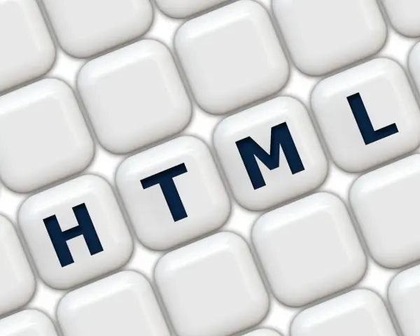 Klawisze z literami H, T, M, L układają się w słowo HTML, symbolizując podstawy programowania.