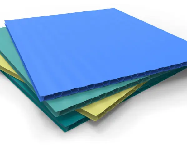 Stack of colorful corrugated plastic sheets, showcasing the lightest plastic material in blue, teal, and yellow.