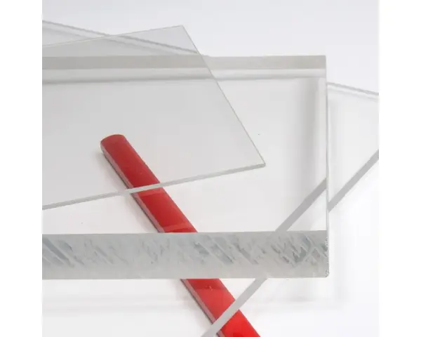 Clear acrylic sheets with a red rod on a white background.