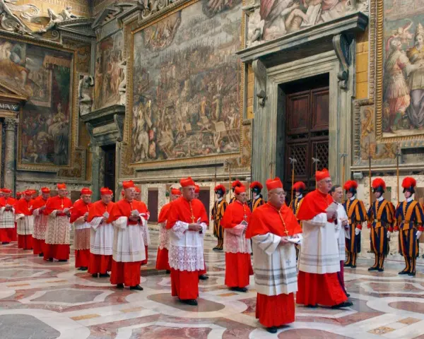 Cardinals in red robes process through a grand hall, a scene hinting at how the Pope is chosen through conclave.