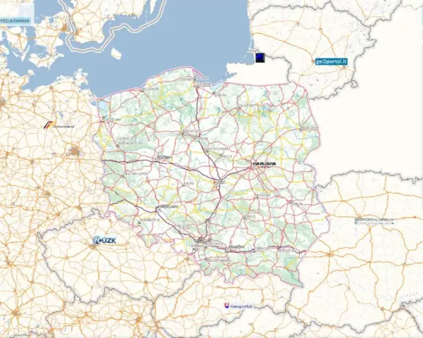 Mapa Polski z zaznaczonymi miastami i drogami. Widoczna warstwa "Ewidencja gruntów i budynków" z numerem ewidencyjnym.