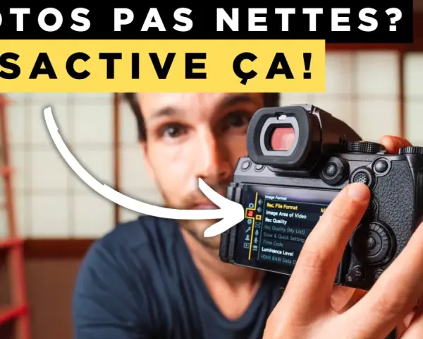Un homme ajuste les réglages d'un appareil photo, l'écran affiche "Rec. File Format". Il désactive l'auto focus pour des photos nettes.