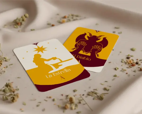 Tarot de La Estrella y El Diablo, con siluetas doradas sobre fondo blanco y amarillo.