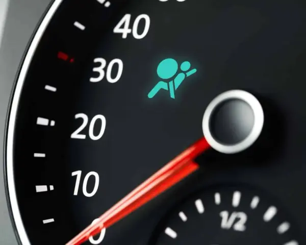 Dashboard light shows the side airbag off symbol, indicating a potential safety issue.