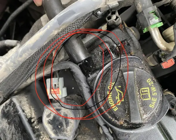 Zaznaczony przewód zapłonowy i wtyczka mogą być przyczyną błędu dtc p0301 volkswagen.