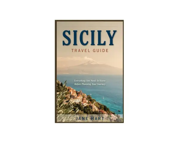 A travel guide to Sicily, featuring a coastal town with Mount Etna in the background. Plan your travel to Sicily with this comprehensive guide.
