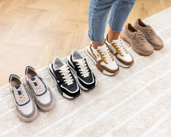 Wybierasz jakie buty na siłownię damskie? Zobacz stylowe sneakersy w różnych kolorach: beżowe, biało-brązowe, czarne i szaro-niebieskie.