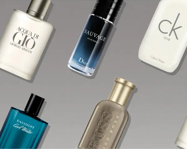 Fünf Flakons mit Herrendüften: Acqua di Gio, Sauvage, CK One, Cool Water, Boss.