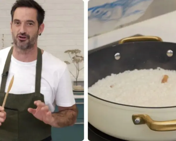 Chef explica cómo preparar una deliciosa paella al horno. Arroz blanco en una sartén, listo para cocinar.
