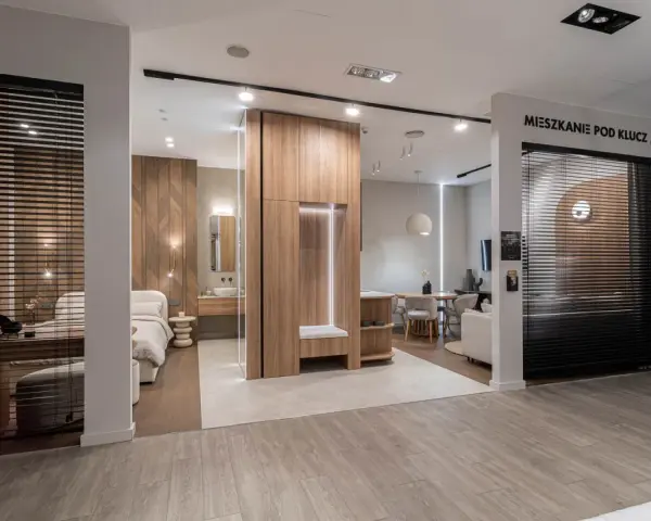 Nowoczesne mieszkanie pod klucz: sypialnia, łazienka i salon z jadalnią. Drewniane akcenty i minimalistyczny design.