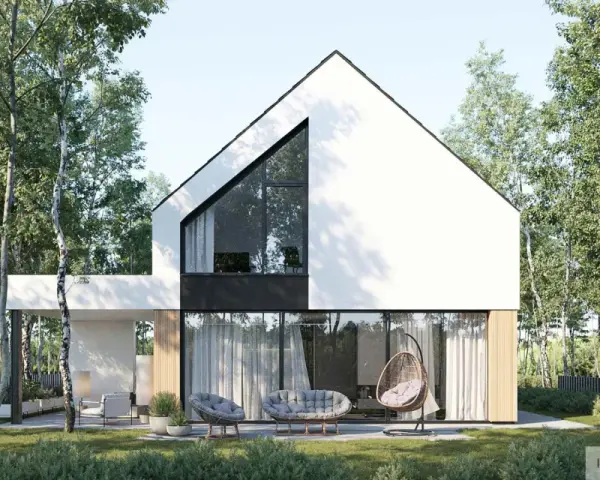Nowoczesne projekty domów szybkich w budowie: biały dom z dużymi przeszkleniami i drewnianymi elementami, otoczony zielenią.