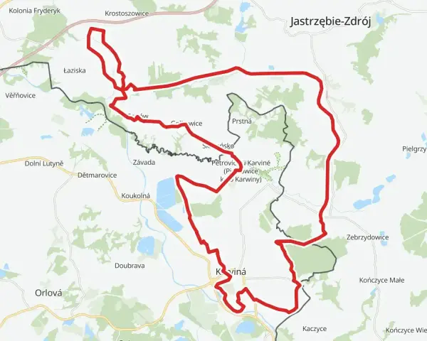 Mapa przedstawia żelazny szlak rowerowy trasa wokół Karwiny i Jastrzębia-Zdroju, prowadząc przez malownicze tereny.