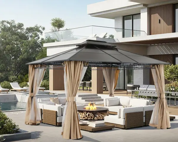 A modern gazebo with curtains creates a cozy outdoor living space. This image shows how to build a gazebo for entertaining, complete with a fire pit and lounge area.