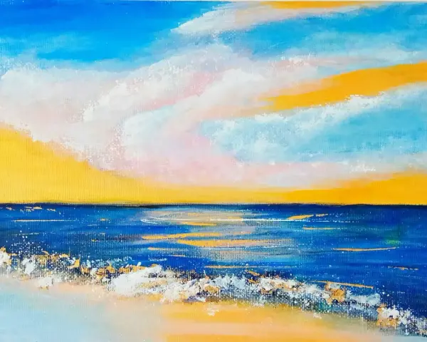 En solnedgång över havet med vågor som slår mot stranden. En vacker inspiration för saker att måla.