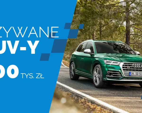 Zielony SUV na drodze w lesie. Używane SUV-y do 100 tys. zł.