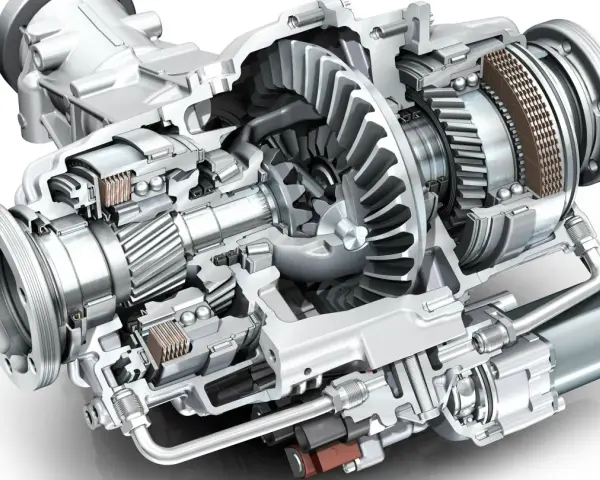 Przekładnia różnicowa z napędem elektrycznym, pokazująca wewnętrzne koła zębate, łożyska i sprzęgło. To jest szpera, co to za mechanizm!